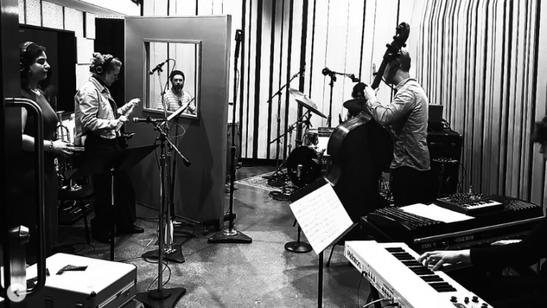 J Rowe and Jordan Schug perform at Rustbelt Studio along with other muscians